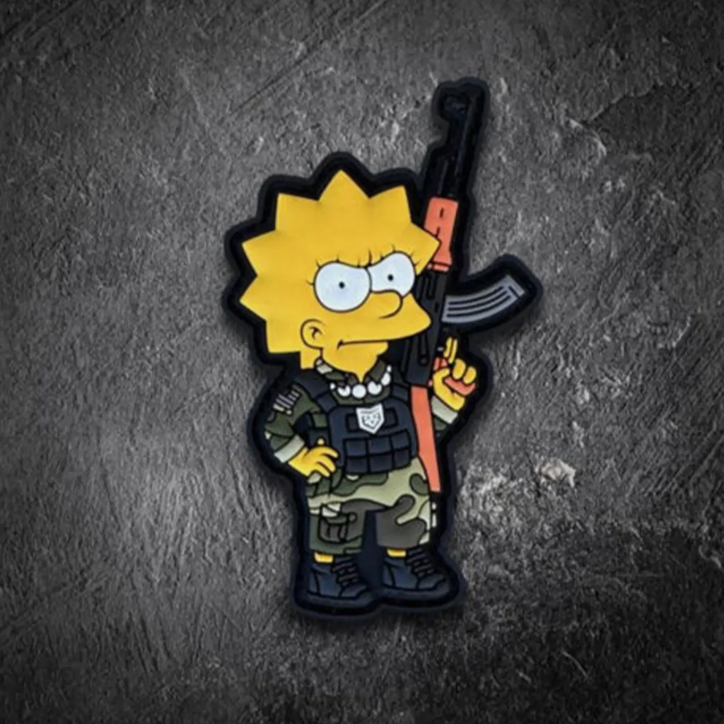 Lisa Simpson holding an AK PVC Patch